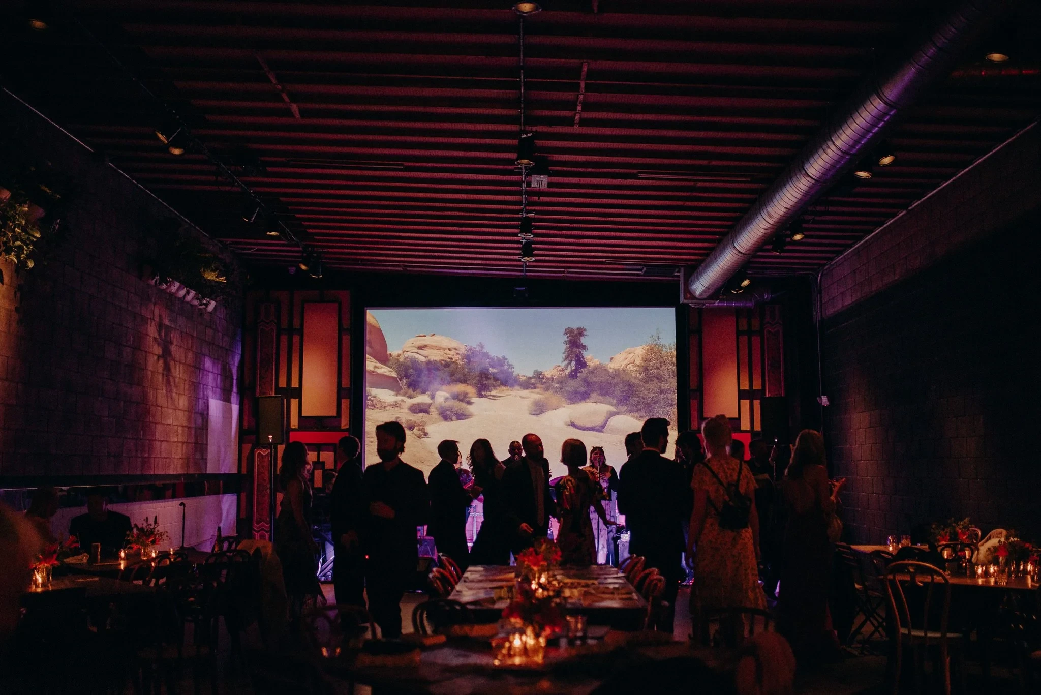 A celebration and cinema projection inside SmogShoppe’s Grand Hall