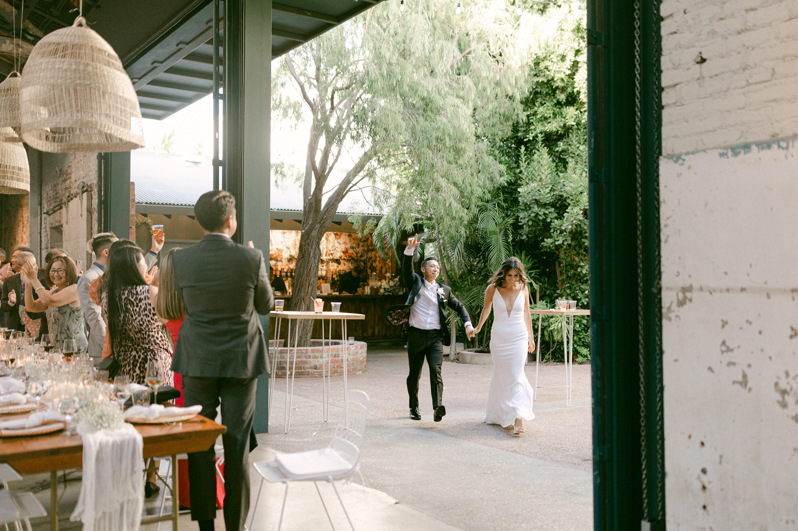 A couple entering Millwick’s garden courtyard