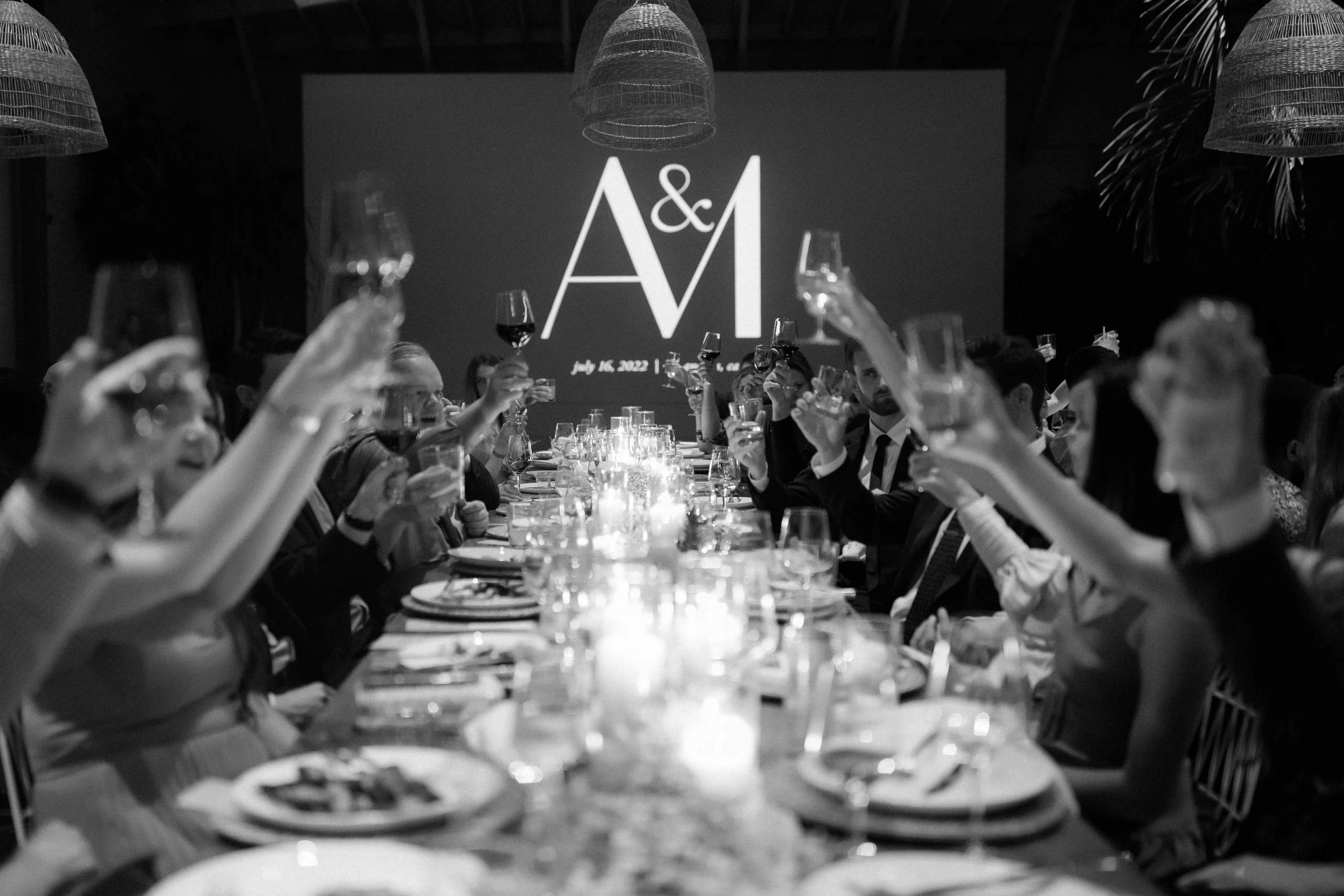 A black-and-white candlelit wedding dinner at Millwick
