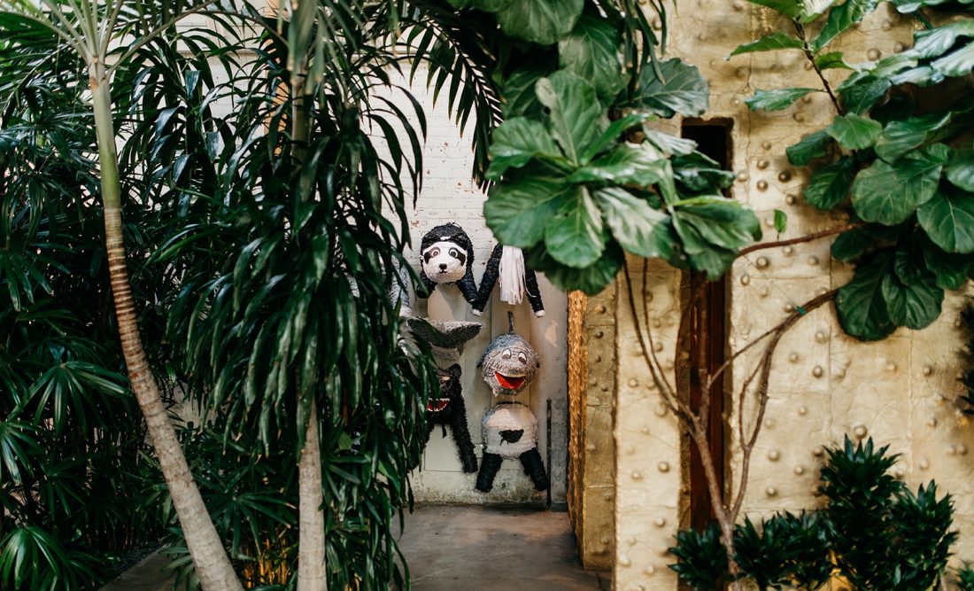The foliage that lines the Grand Hall’s golden walls obscure a small secret garden, perfect for surprise guest experiences. (BYO animal friends.)