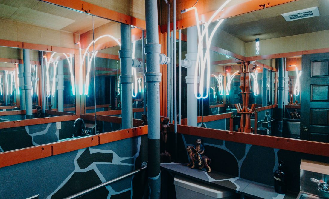 Flora Chang’s retro restroom features a glowing, selfie-ready neon light installation.